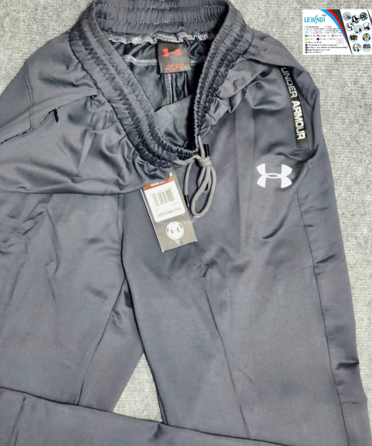 Pantalon jogging sport Under Armour (gris foncé) avec fermeture TSPJ04