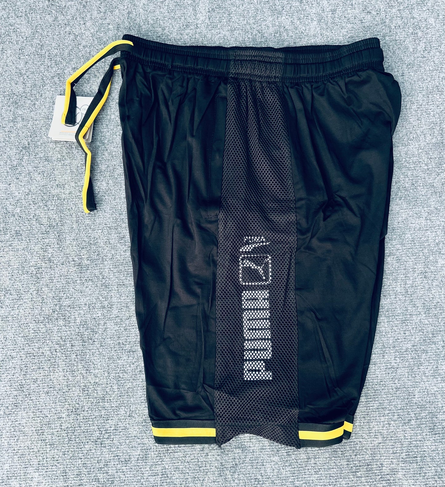 Short loisir Puma noir (bande Jaune) avec fermeture SSMSP09