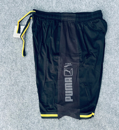 Short loisir Puma noir (bande Jaune) avec fermeture SSMSP09